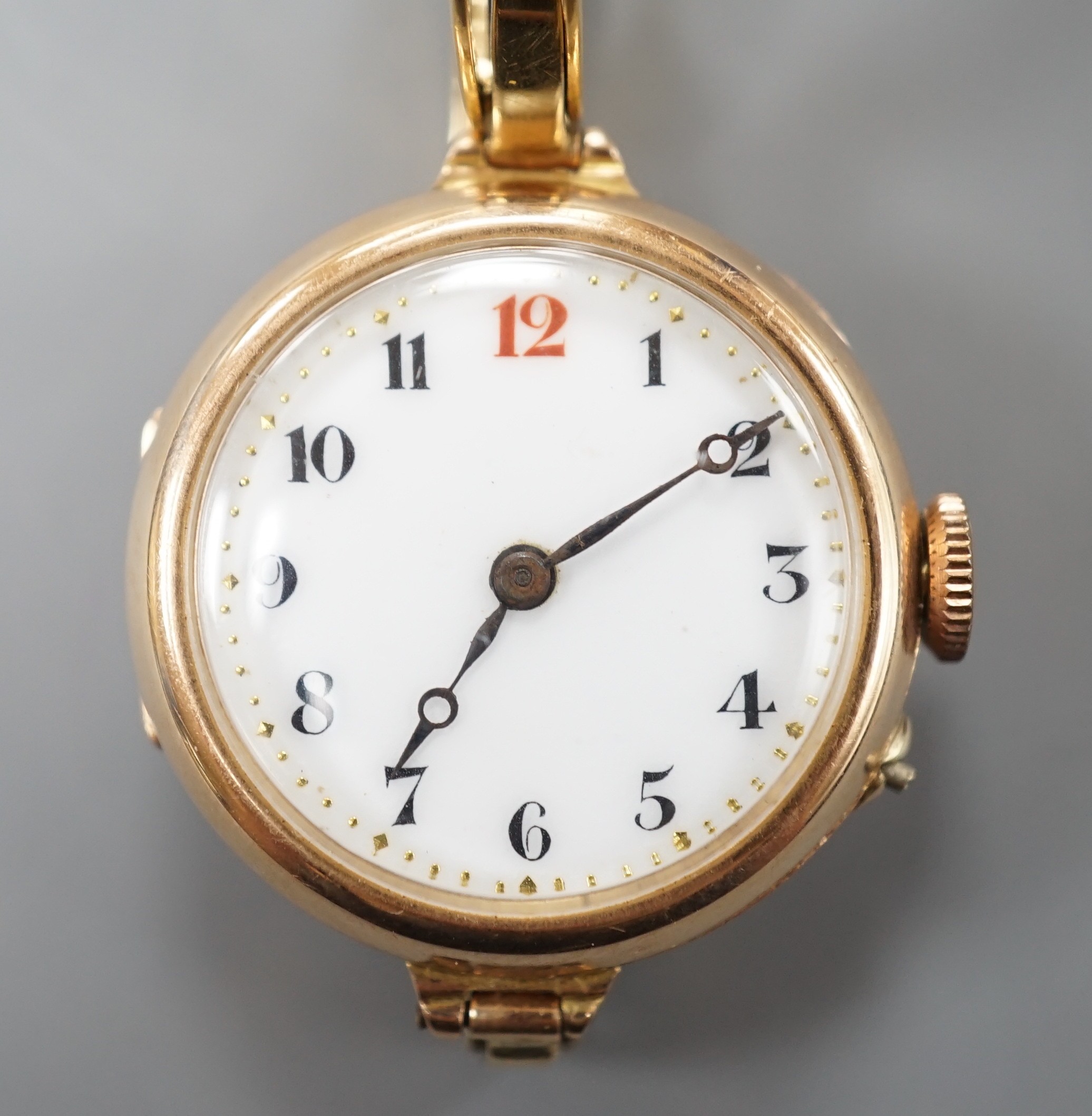 A lady's George V 15ct gold lady's manual wind wrist watch, London, 1918, on a 15ct flexible bracelet